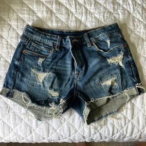 Distressed Mid-rise Denim shorts
